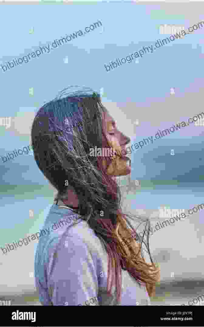 A Captivating Image Of A Young Woman Standing On A Beach, Her Eyes Closed As The Wind Caresses Her Hair, Symbolizing The Emotional Turmoil And Hope Found In The Novel Love Other Natural Disasters Misa Sugiura