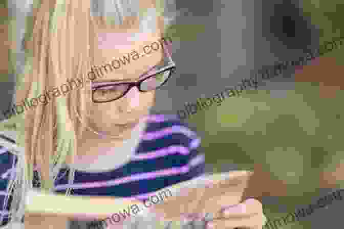 A Young Girl Engrossed In Reading Bite The Big Apple (Baby Girl 4)